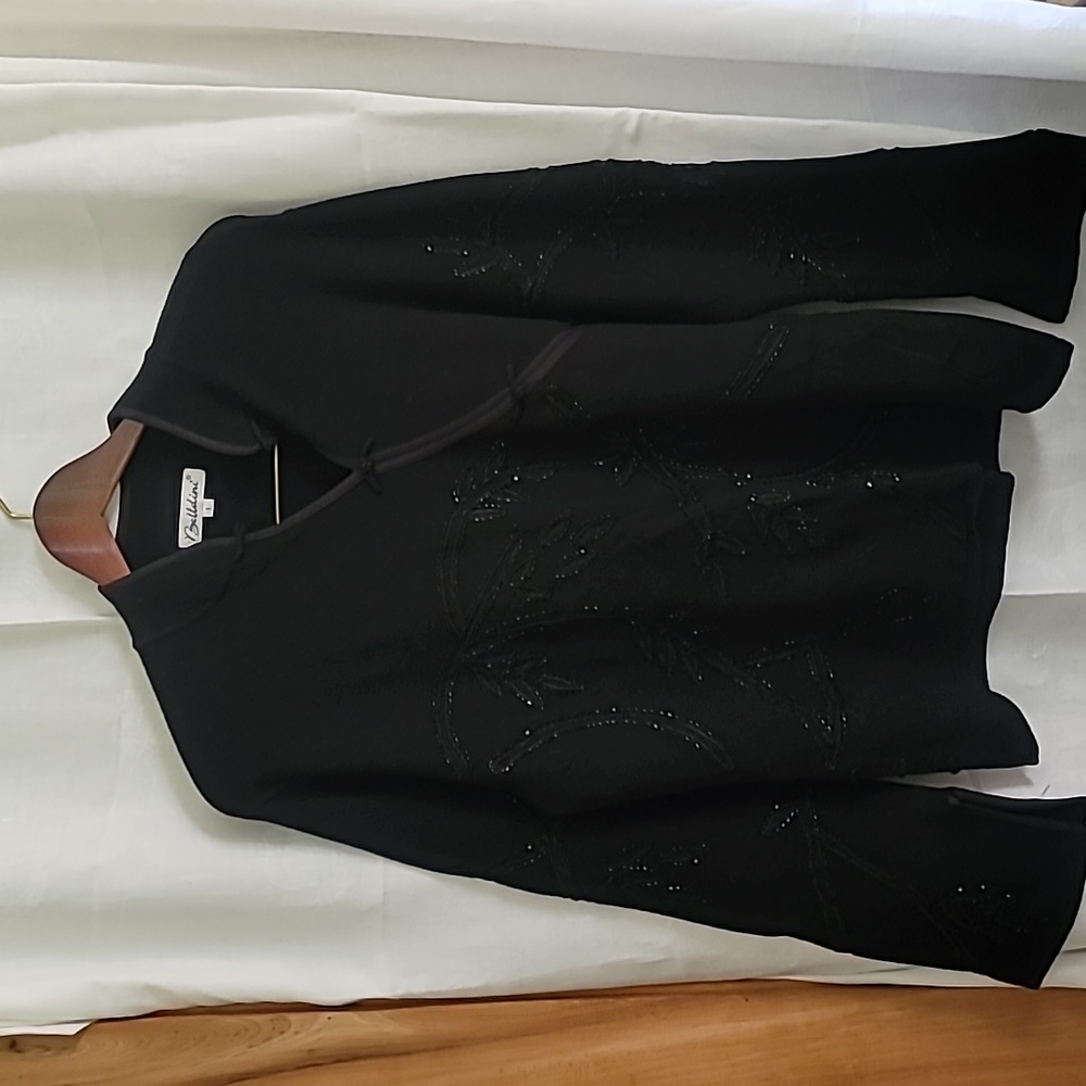 A beautiful black embellished sweater, size L
